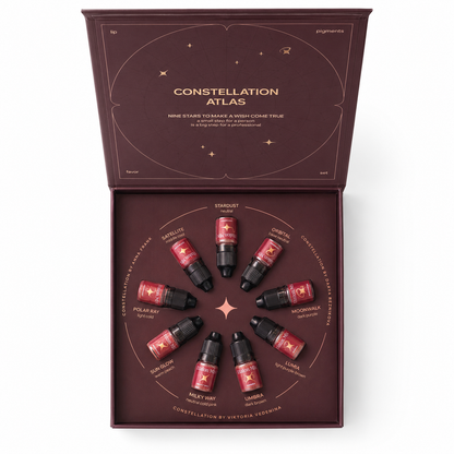 Etalon Mix Favor Lip Set aperto con 9 pigmenti PMU labbra disposti a costellazione: Stardust, Satellite, Polar Ray, Sun Glow, Milky Way, Umbra, Lumia, Moonwalk e Orbital.