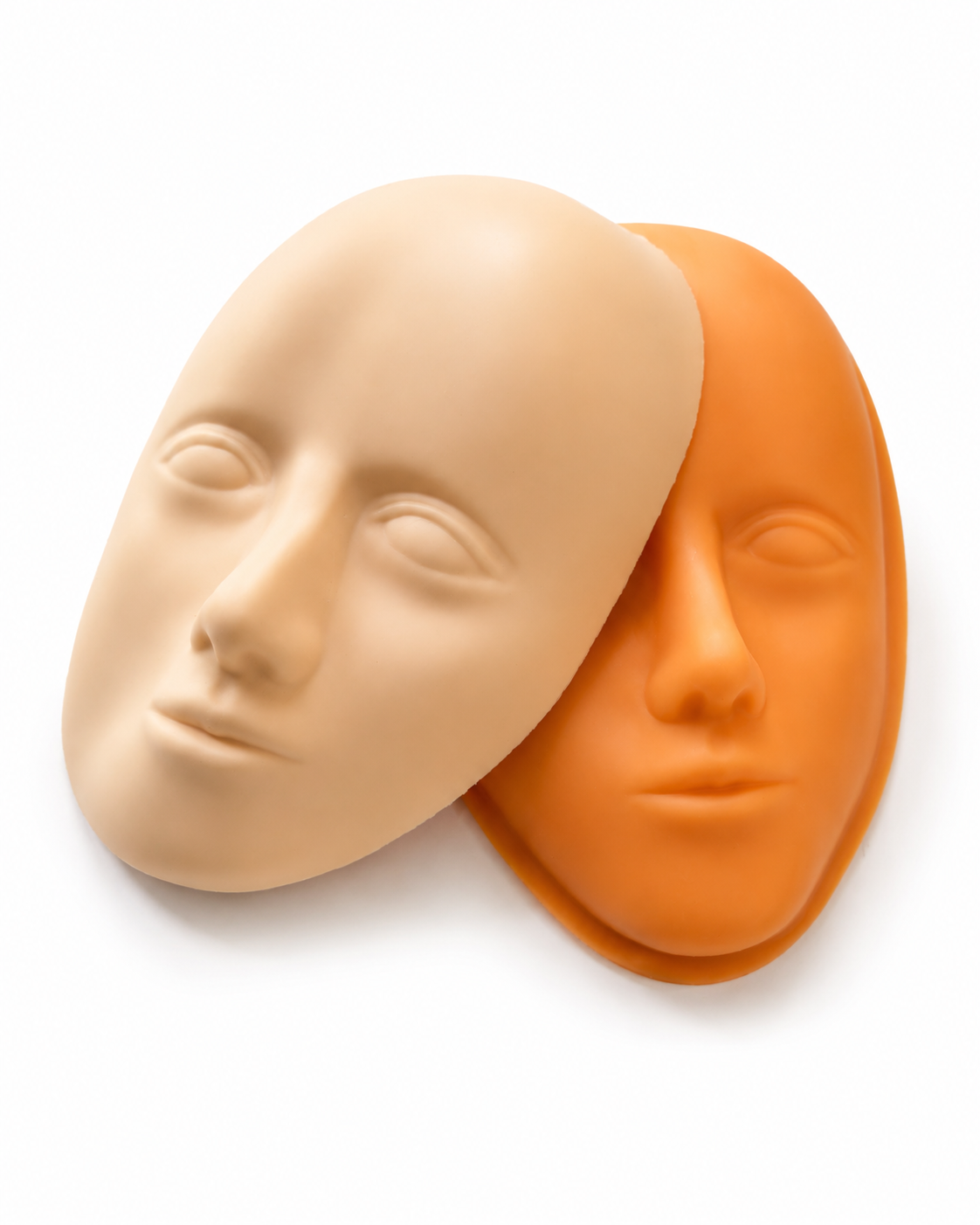 Due maschere viso in silicone per pratica PMU e dermopigmentazione, ideali per esercitazioni tecniche su diverse aree del volto.