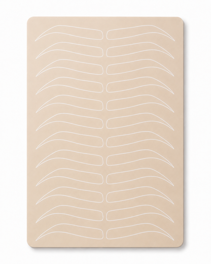 Tappetino in silicone color pelle con sagome sopracciglia per esercitazioni di microblading, hairstroke e trucco permanente.
